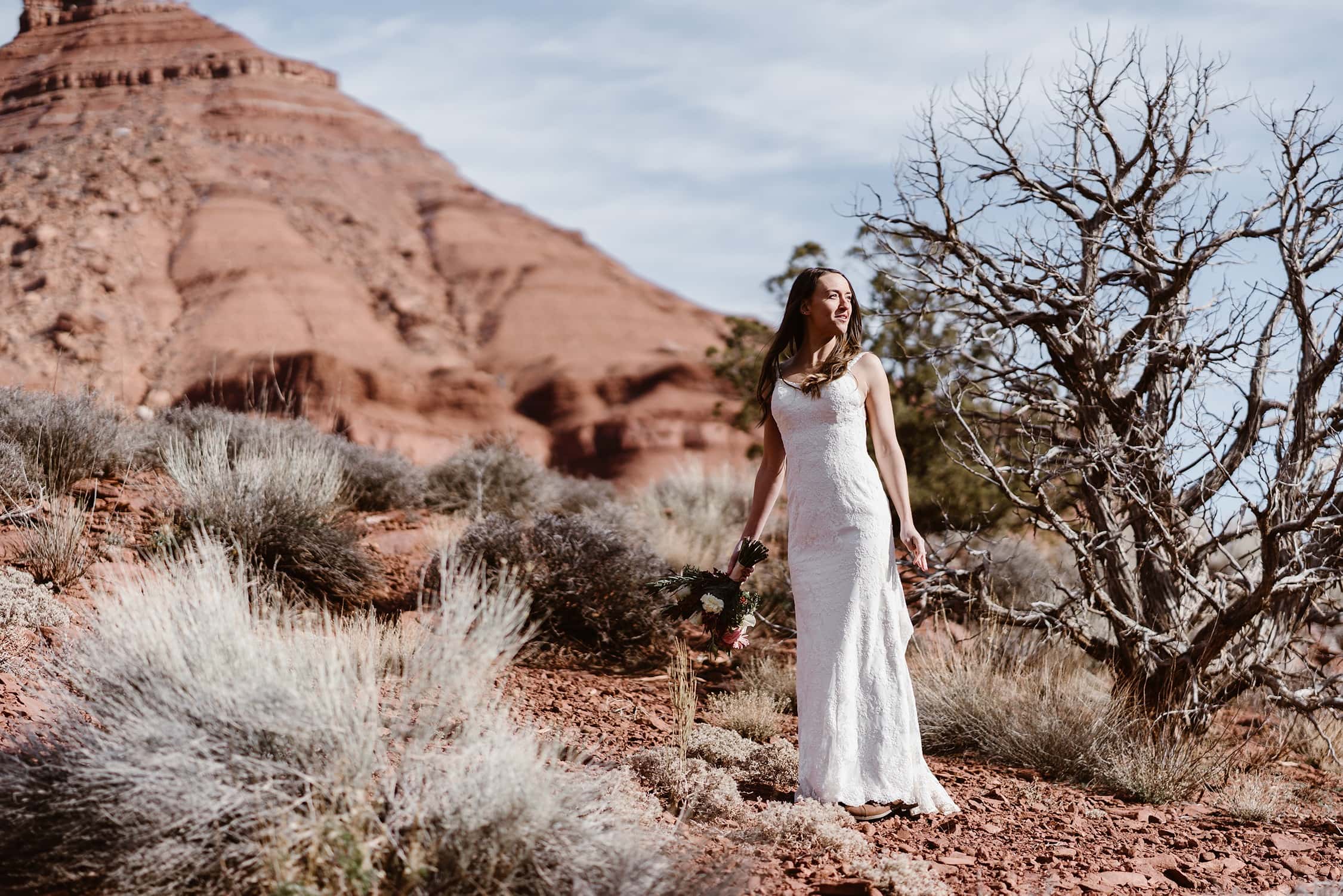 Bride Hiking During Moab Elopement