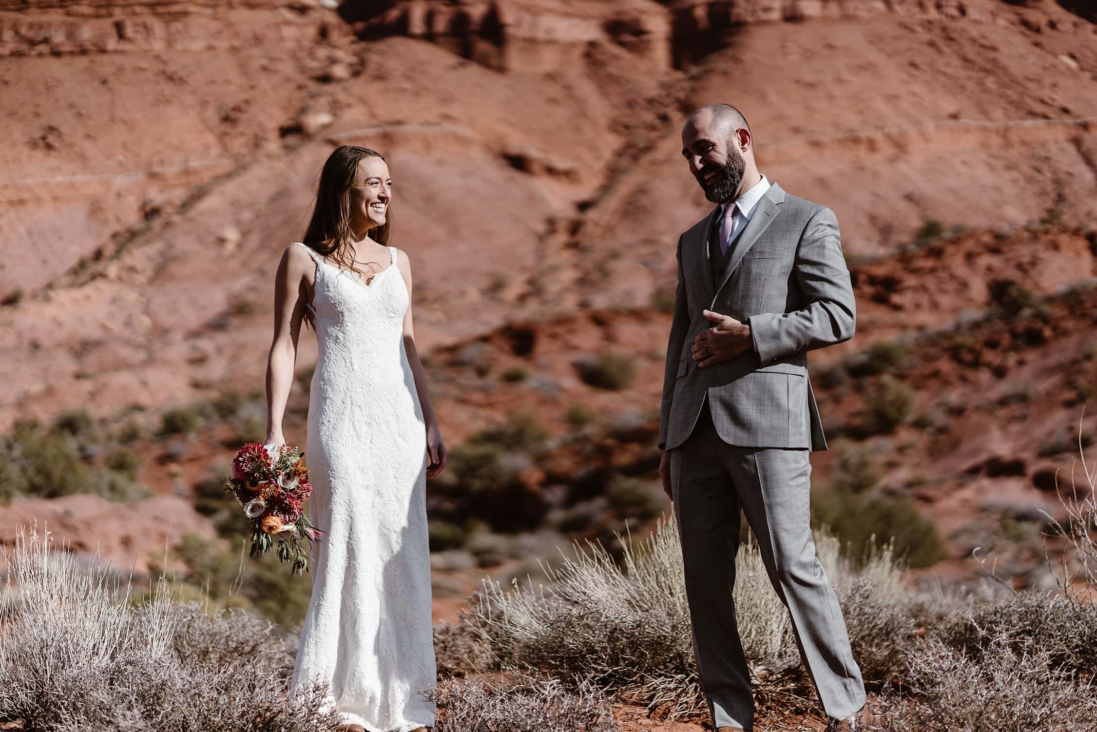 Bride and Groom Laughing at Moab Elopement