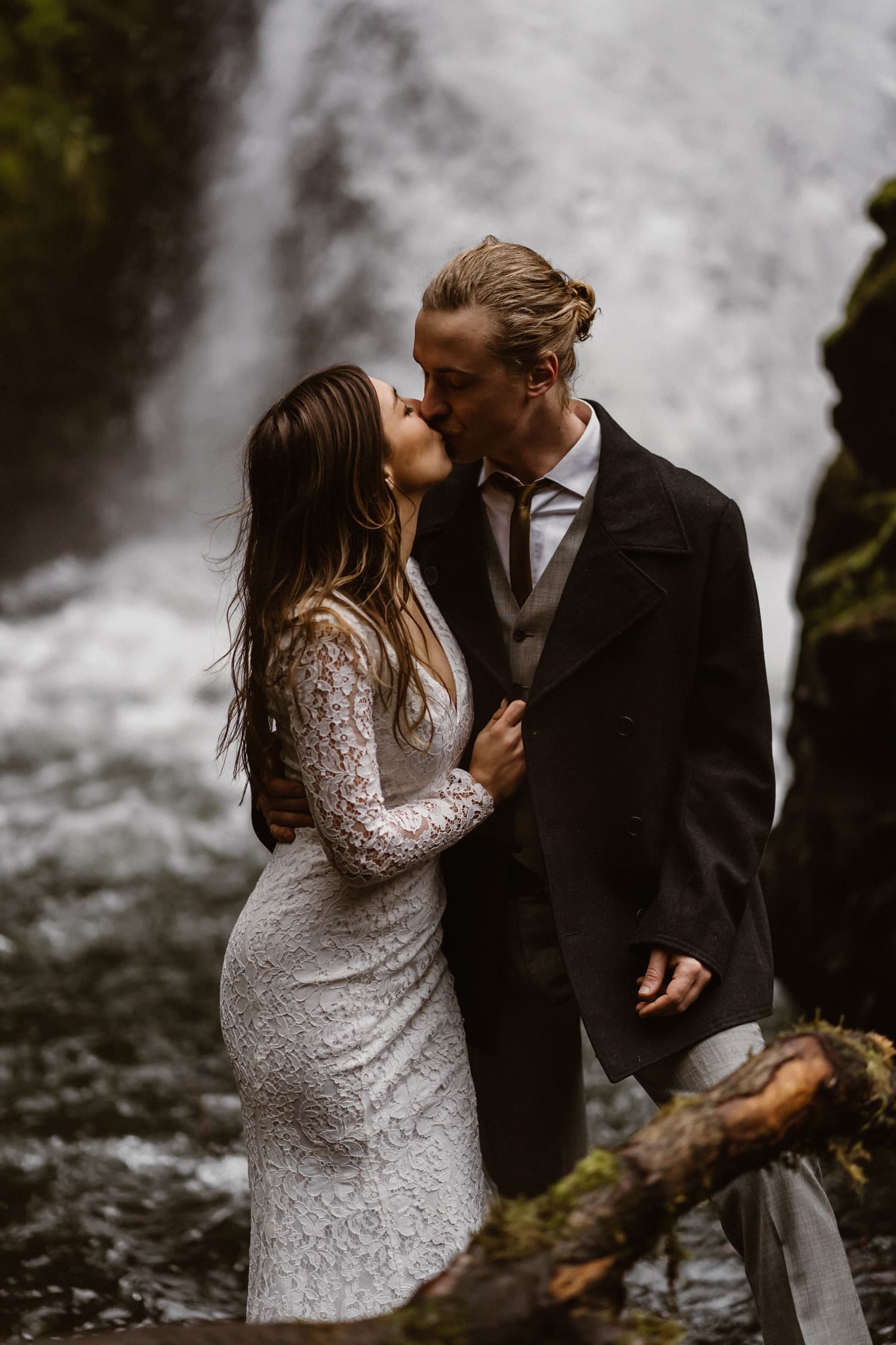 Bride and Groom Kissing at Oregon Adventurous Waterfall elopement