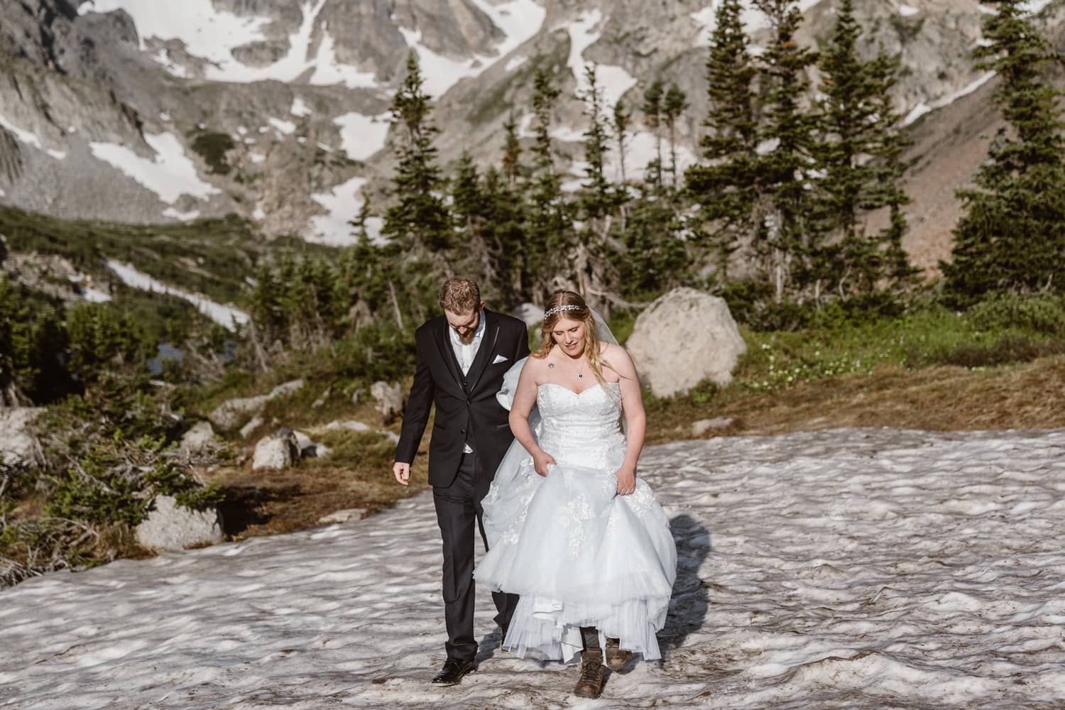 Bride and Groom Hiking at Colorado Adventure Elopement