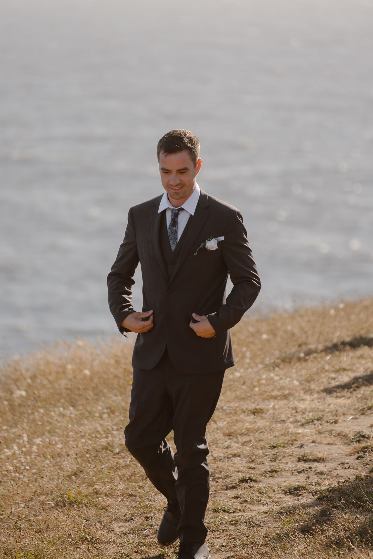 Groom at first look in Big Sur Elopement