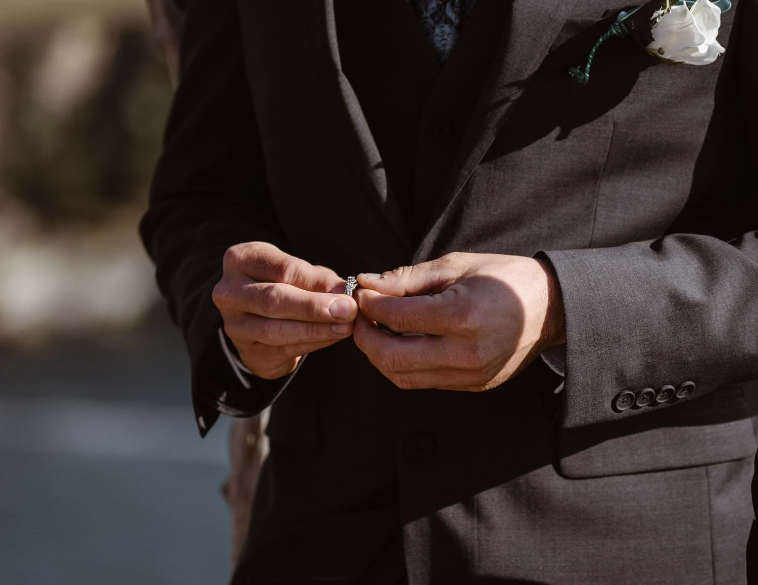 Groom Holding Ring at Big Sur Elopement