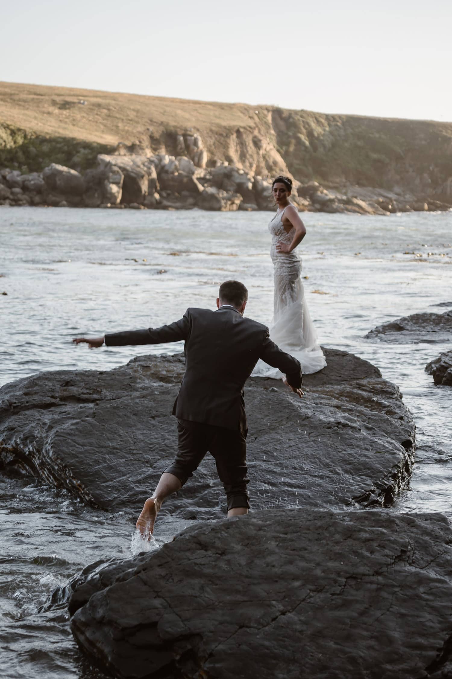 Bride and Groom in the tide pools at Big Sur Elopement