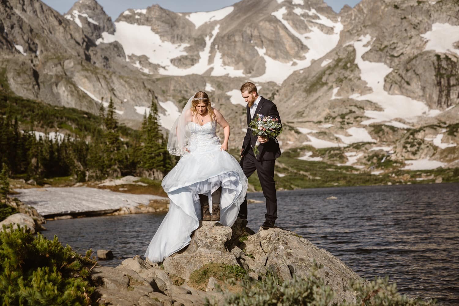 Bride and Groom Hiking at Colorado Adventure Elopement