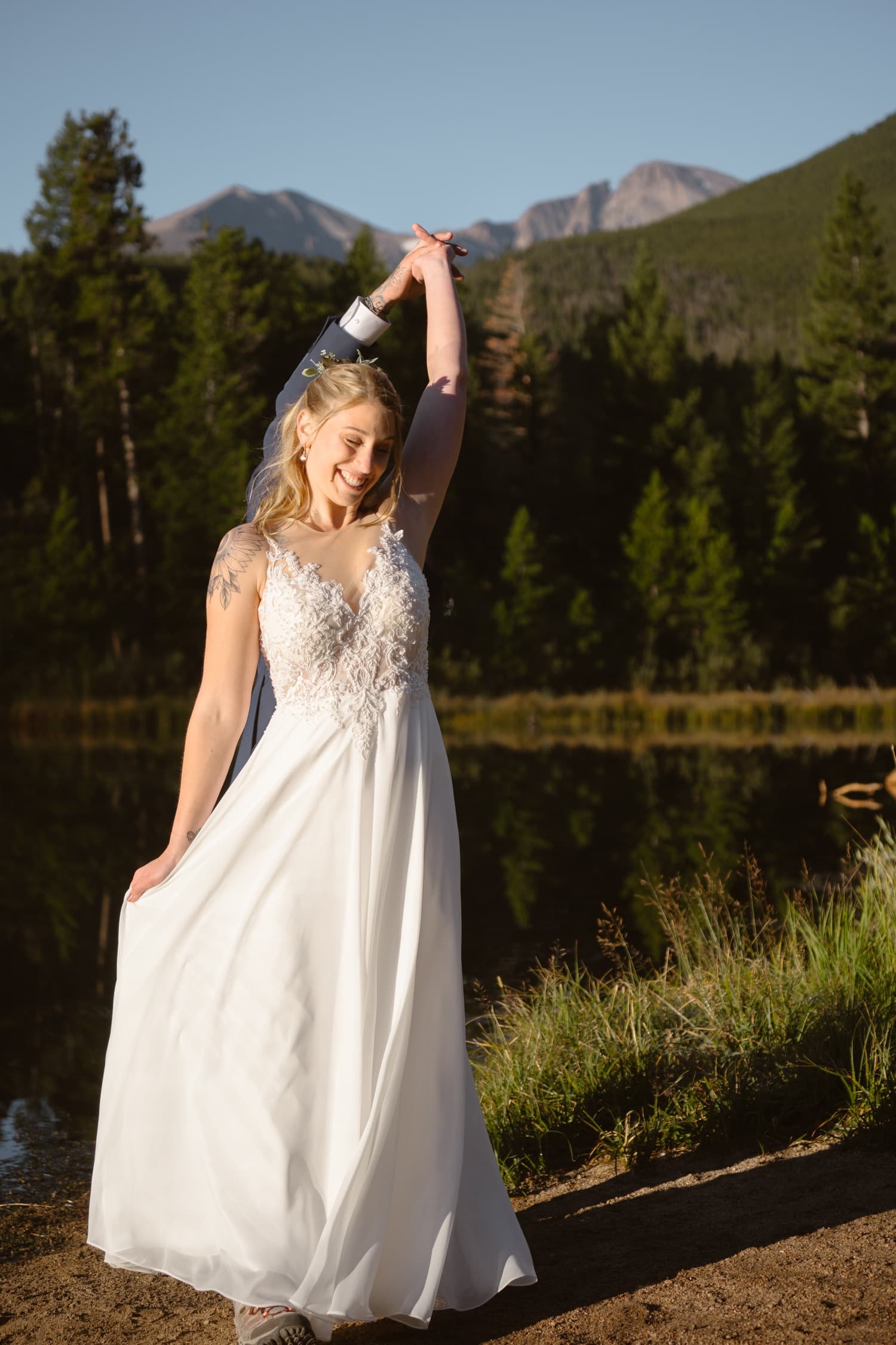 Bride and Groom dancing at Lily Lake Rocky Mountain National Park Elopement