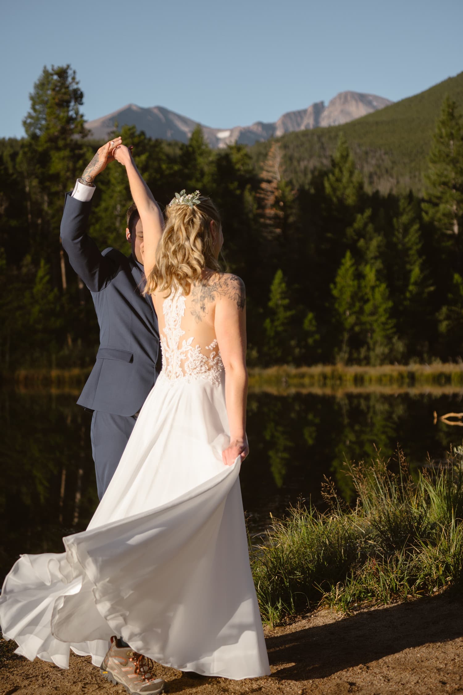 Bride and Groom dancing at Lily Lake Rocky Mountain National Park Elopement