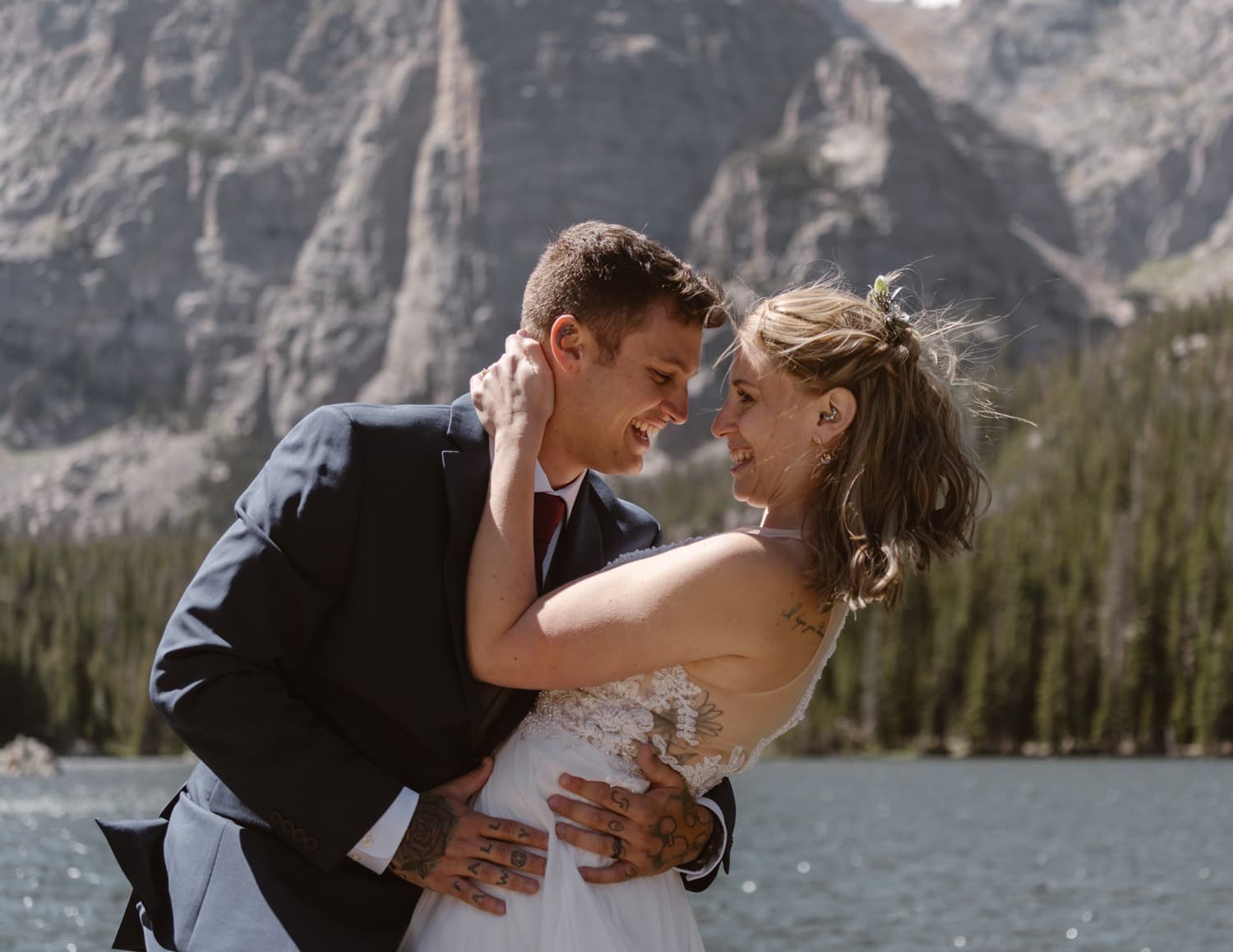 Bride and groom at Loch Lake at Rocky Mountain National Park Hiking Elopement