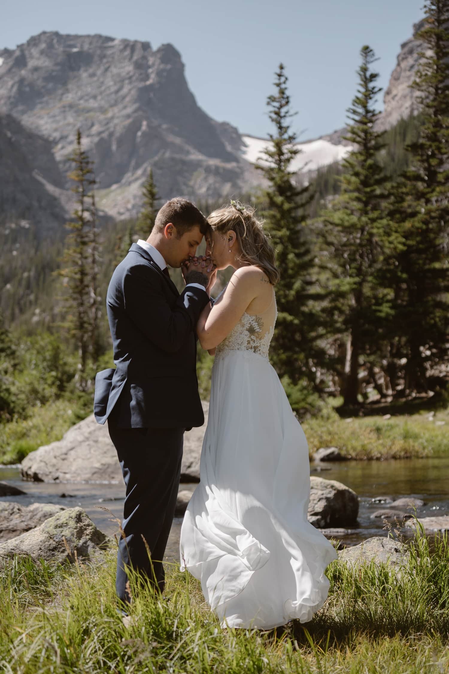 Bride and groom at Loch Lake at Rocky Mountain National Park Hiking Elopement