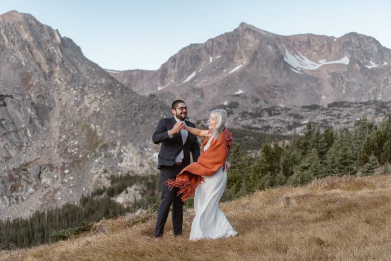 Couple sharing a dance at their hiking wedding.