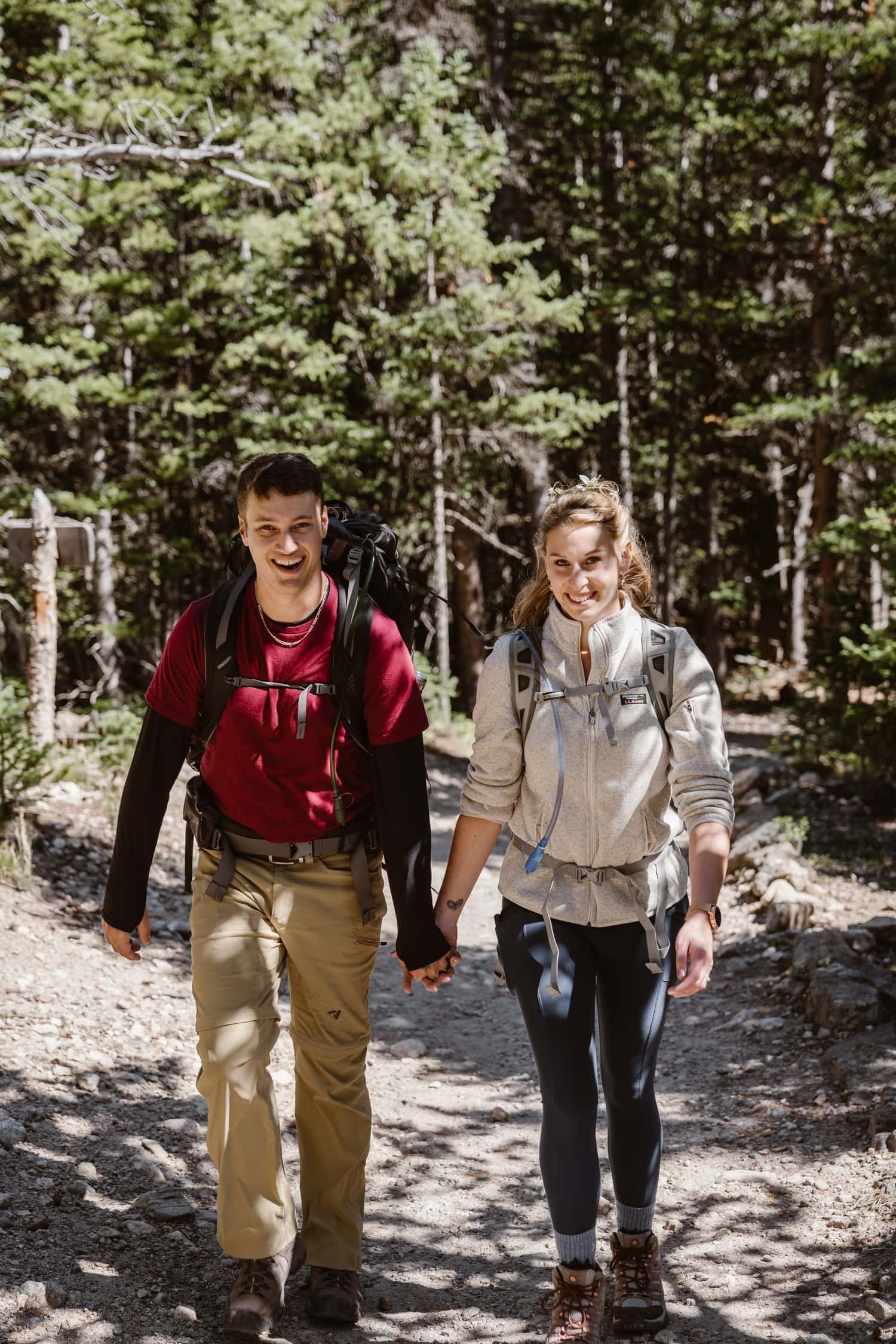 Bride and Groom Hiking at Rocky Mountain National Park Elopement