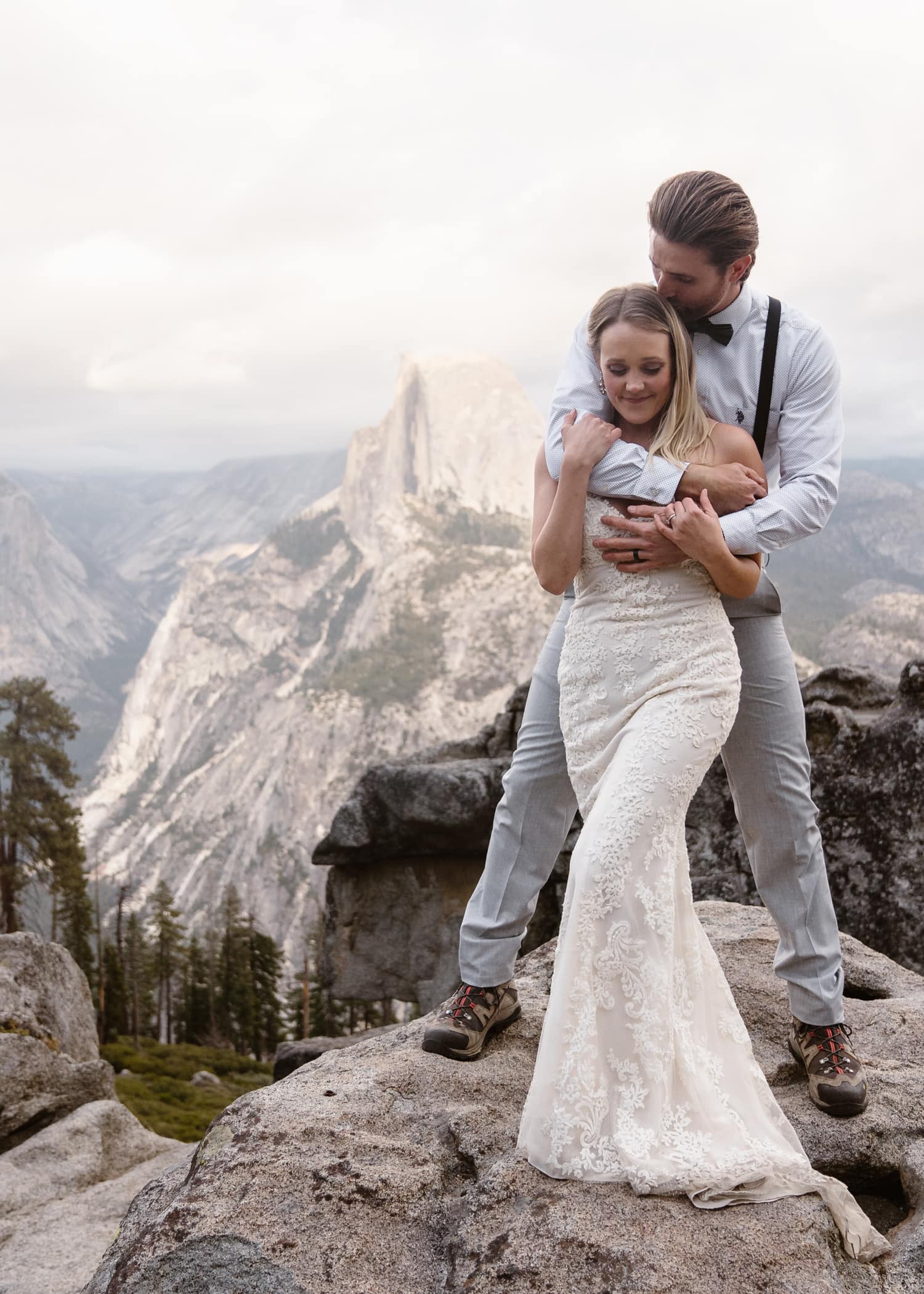 Bride and Groom Hugging at Glacier Point Yosemite Elopement