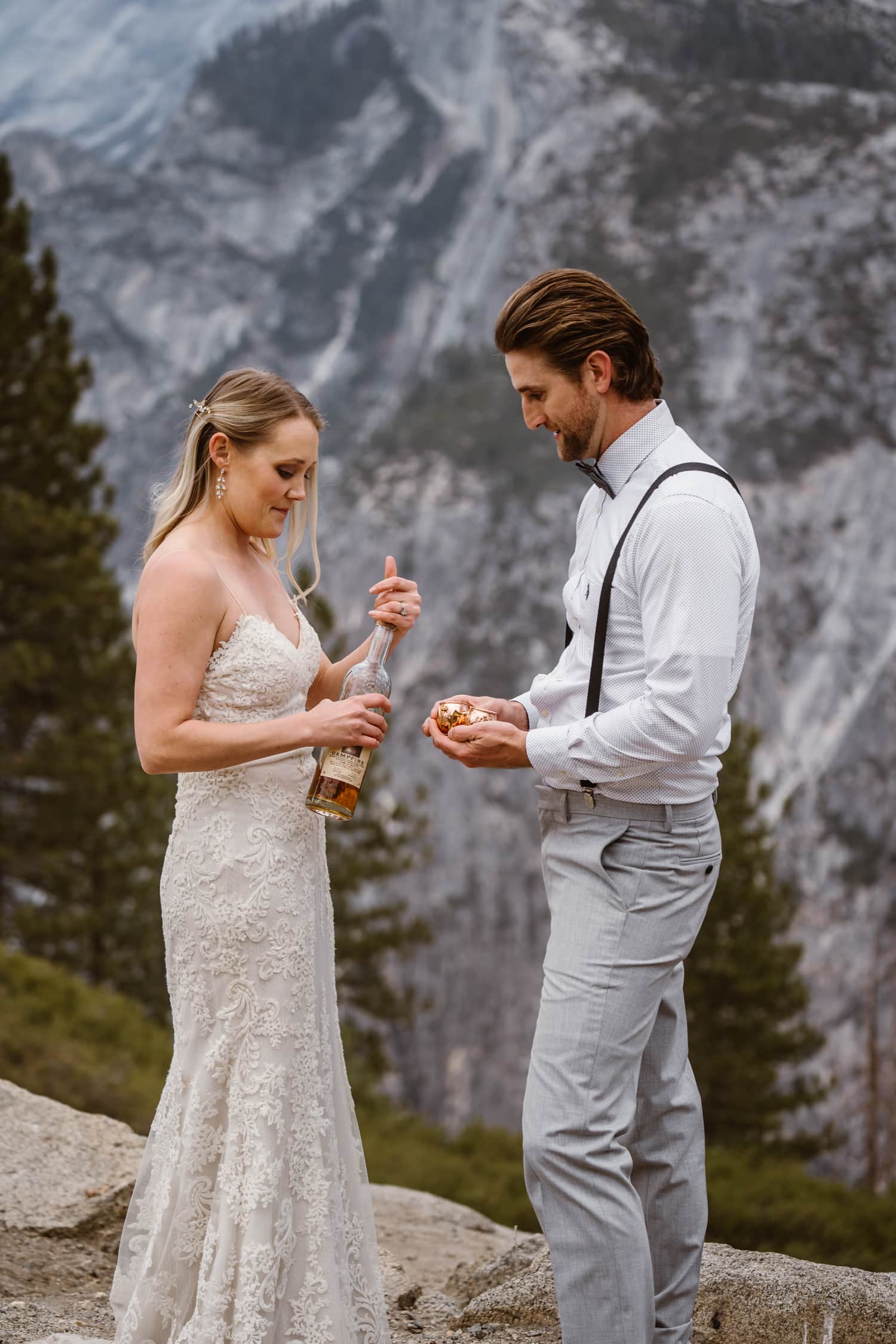 Bride and Groom Drinking Whiskey at Glacier Point Yosemite Elopement