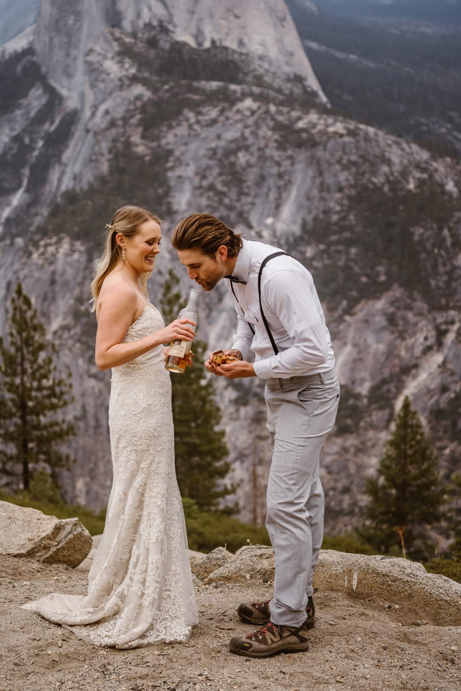 Bride and Groom Drinking Whiskey at Glacier Point Yosemite Elopement