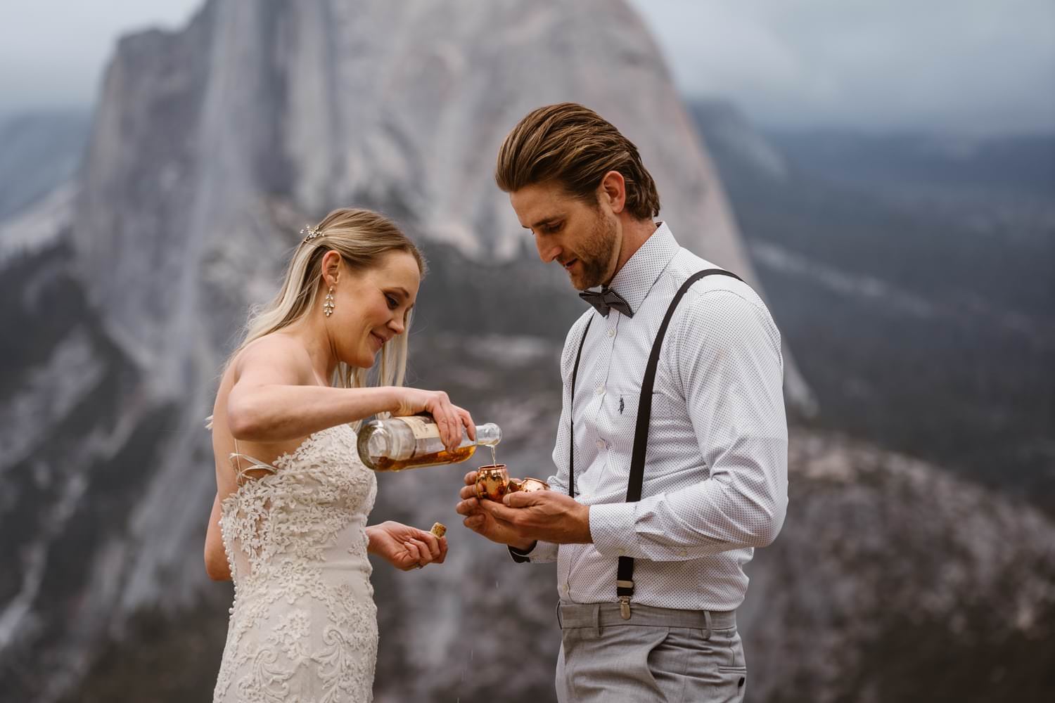 Bride and Groom Drinking Whiskey at Glacier Point Yosemite Elopement