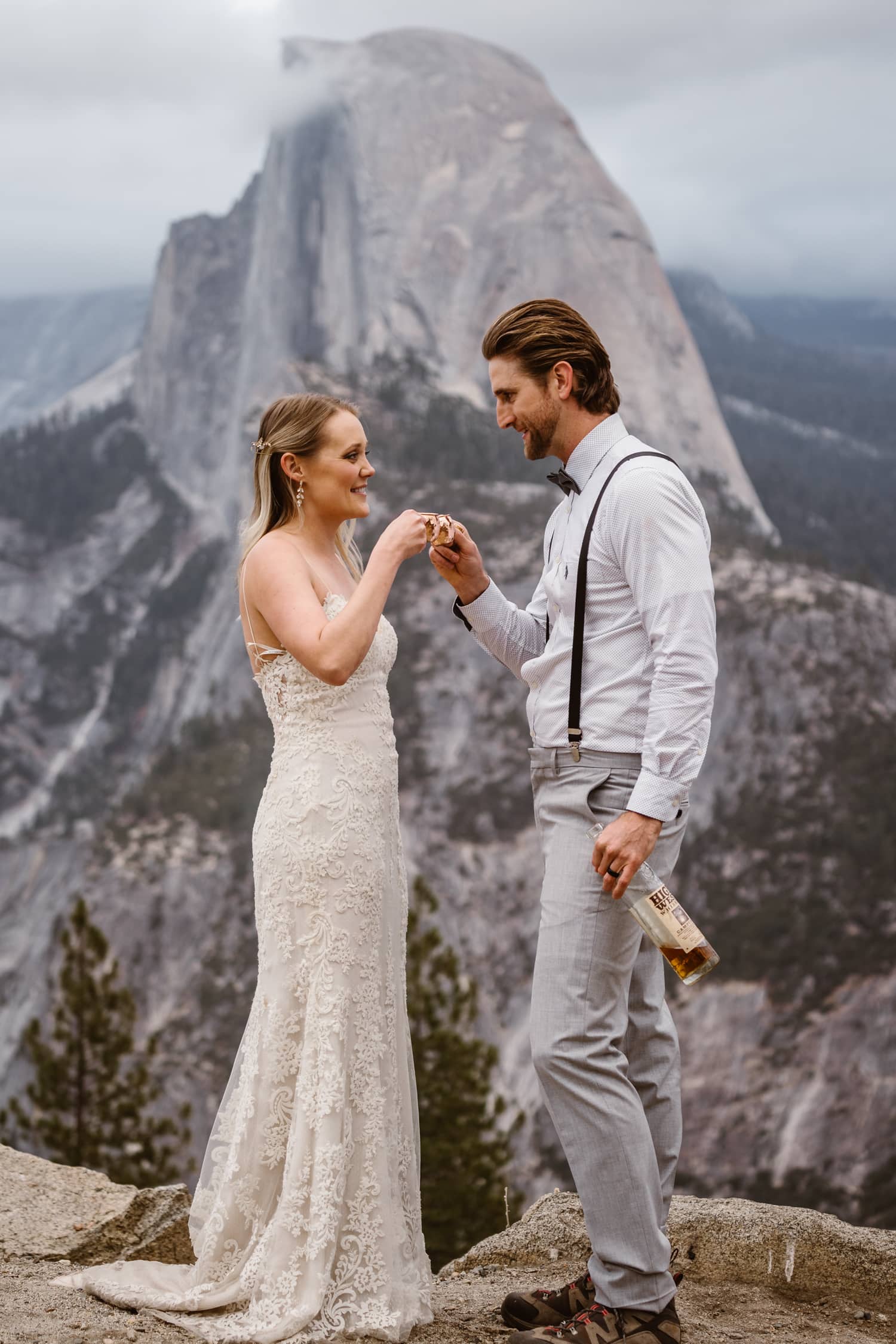 Bride and Groom Drinking Whiskey at Glacier Point Yosemite Elopement