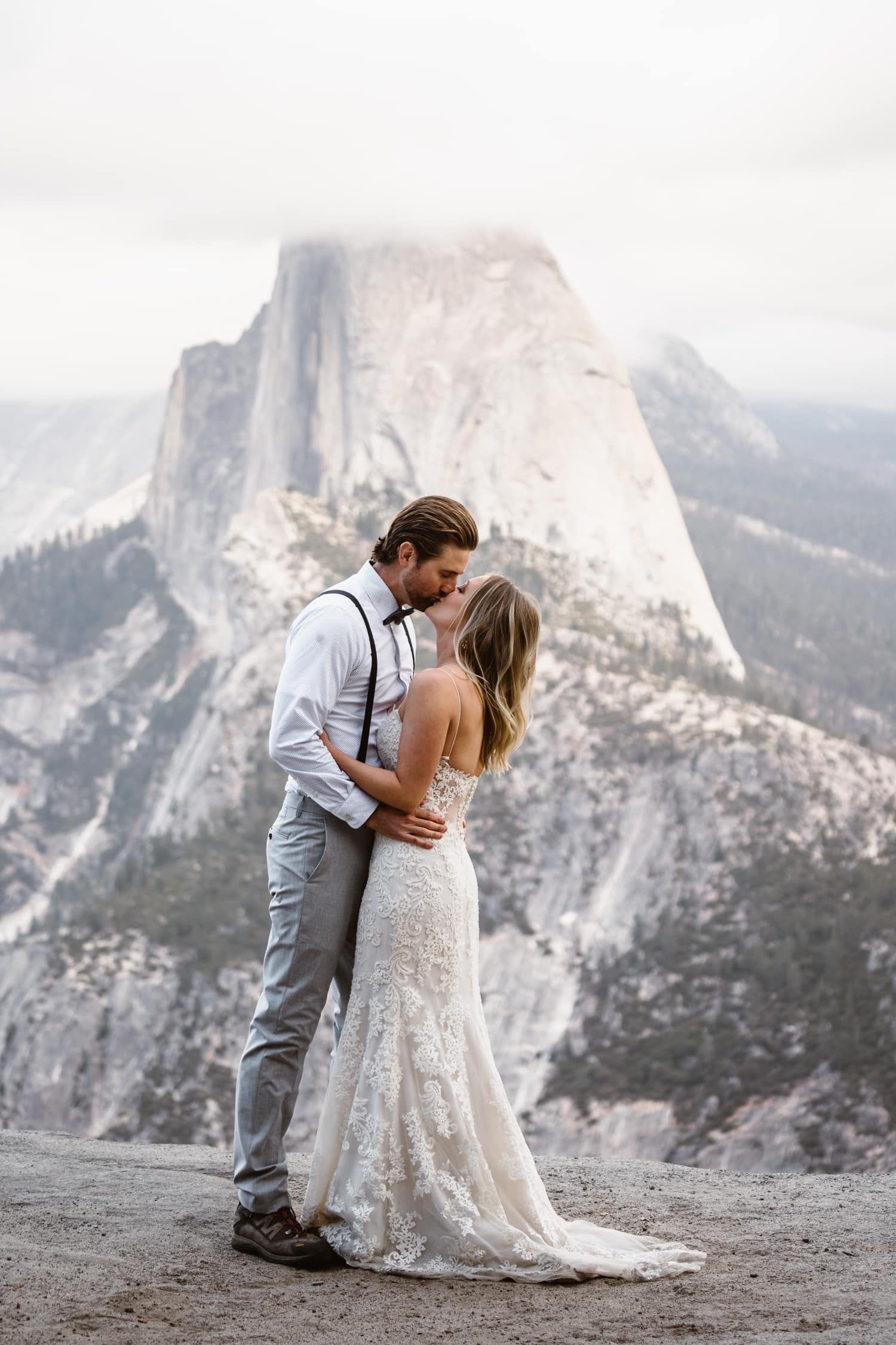 Bride and Groom Kissing at Glacier Point Yosemite Elopement