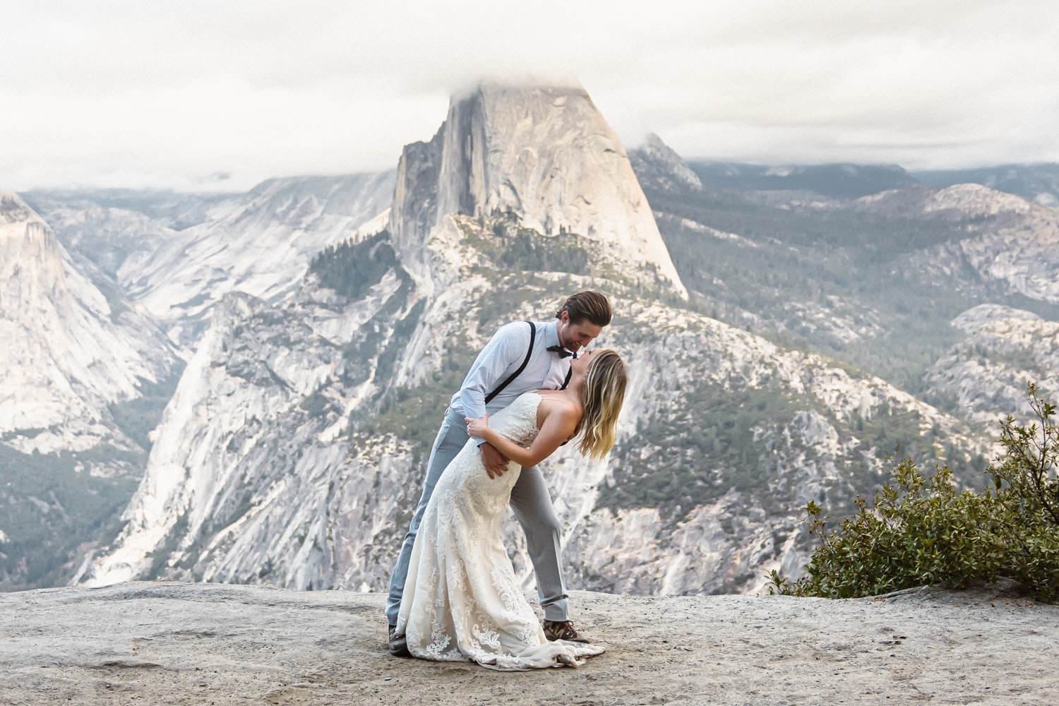 Bride and Groom Kissing at Glacier Point Yosemite Elopement