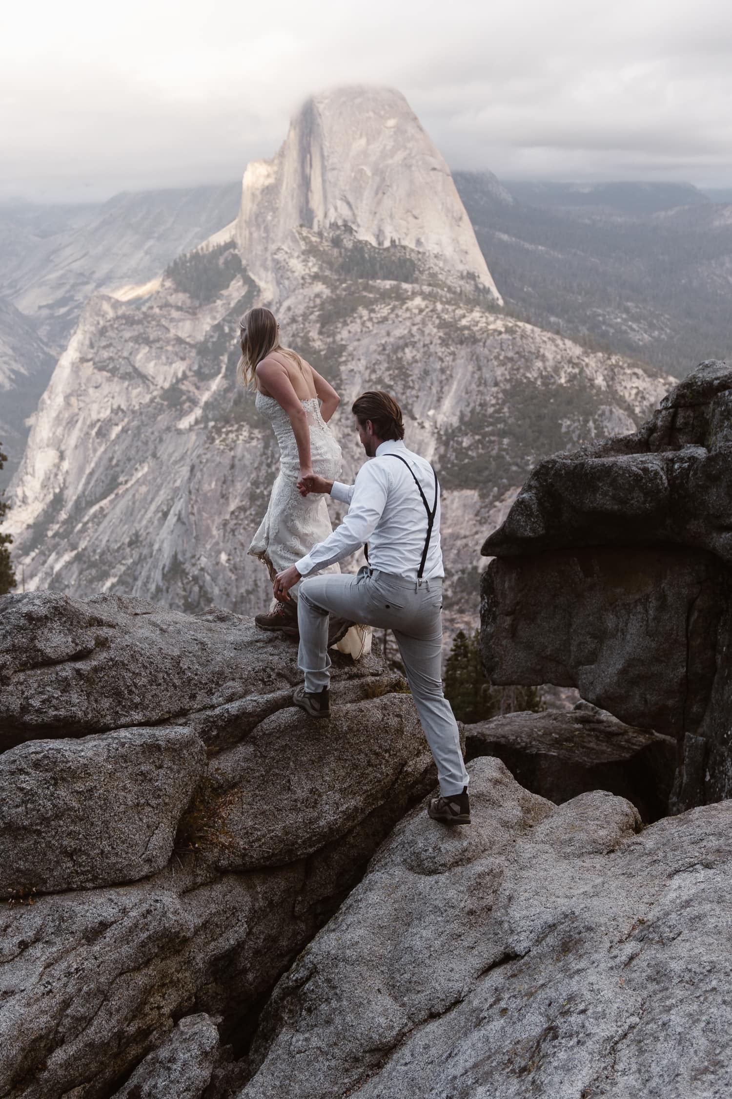 Bride and Groom Hiking at Glacier Point Yosemite Elopement