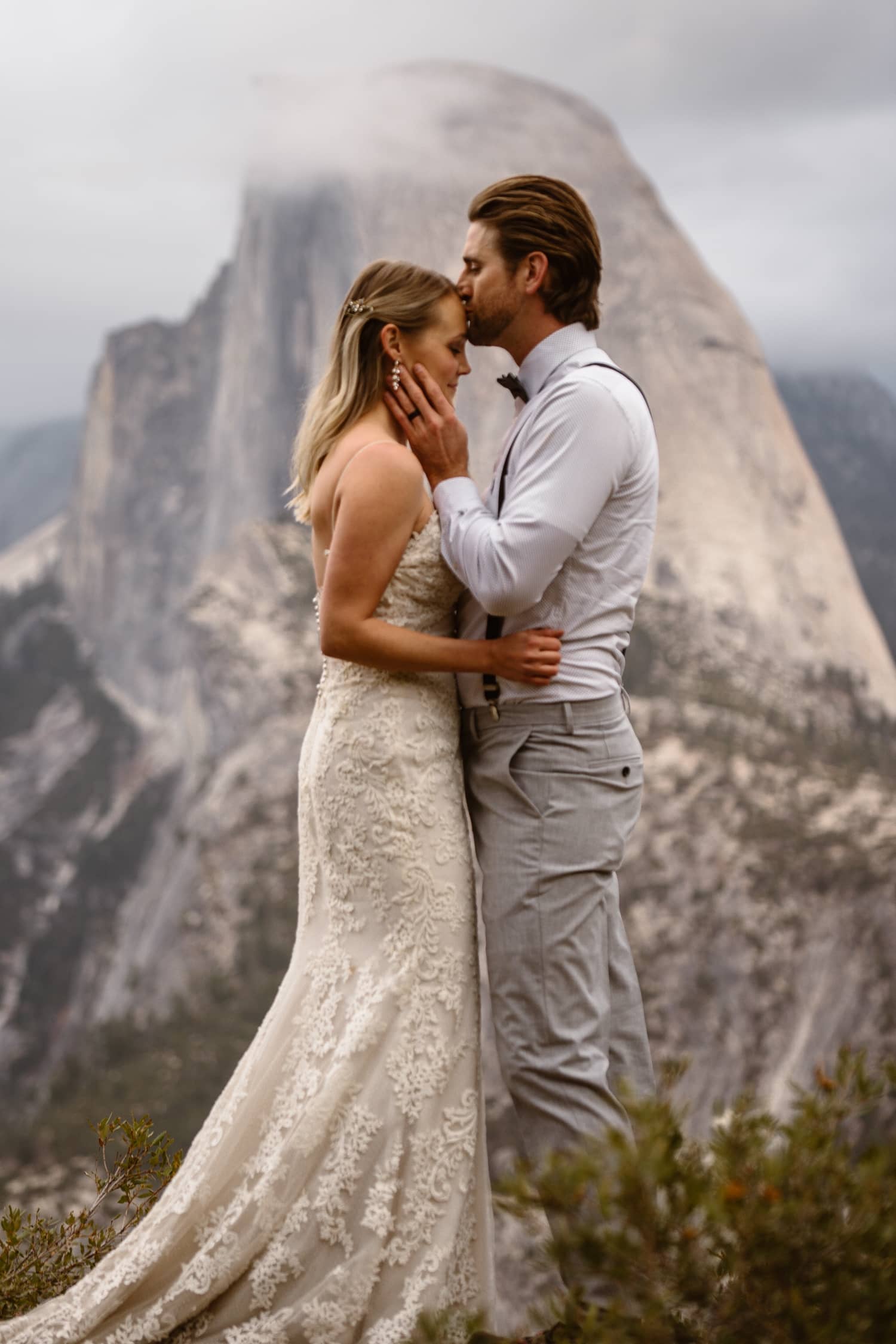 Bride and Groom Kissing at Glacier Point Yosemite Elopement