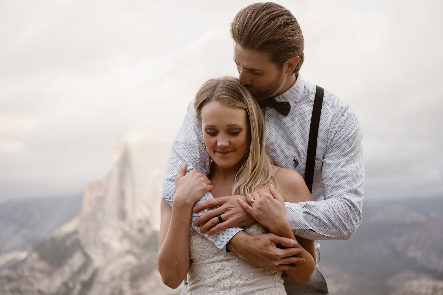 Bride and Groom Hugging at Glacier Point Yosemite Elopement