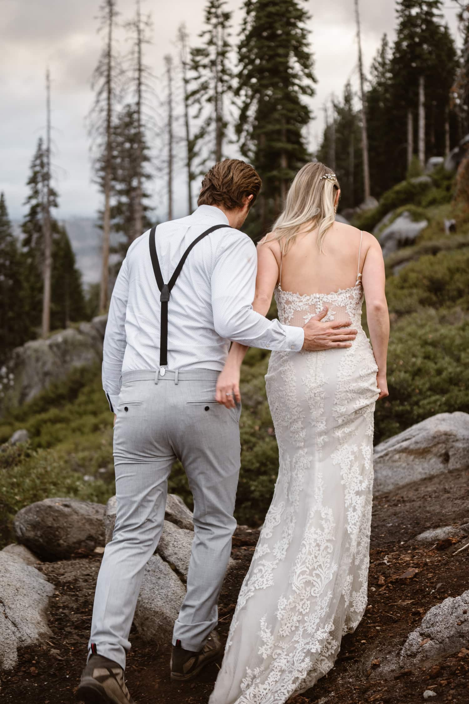 Bride and Groom Hiking at Glacier Point Yosemite Elopement