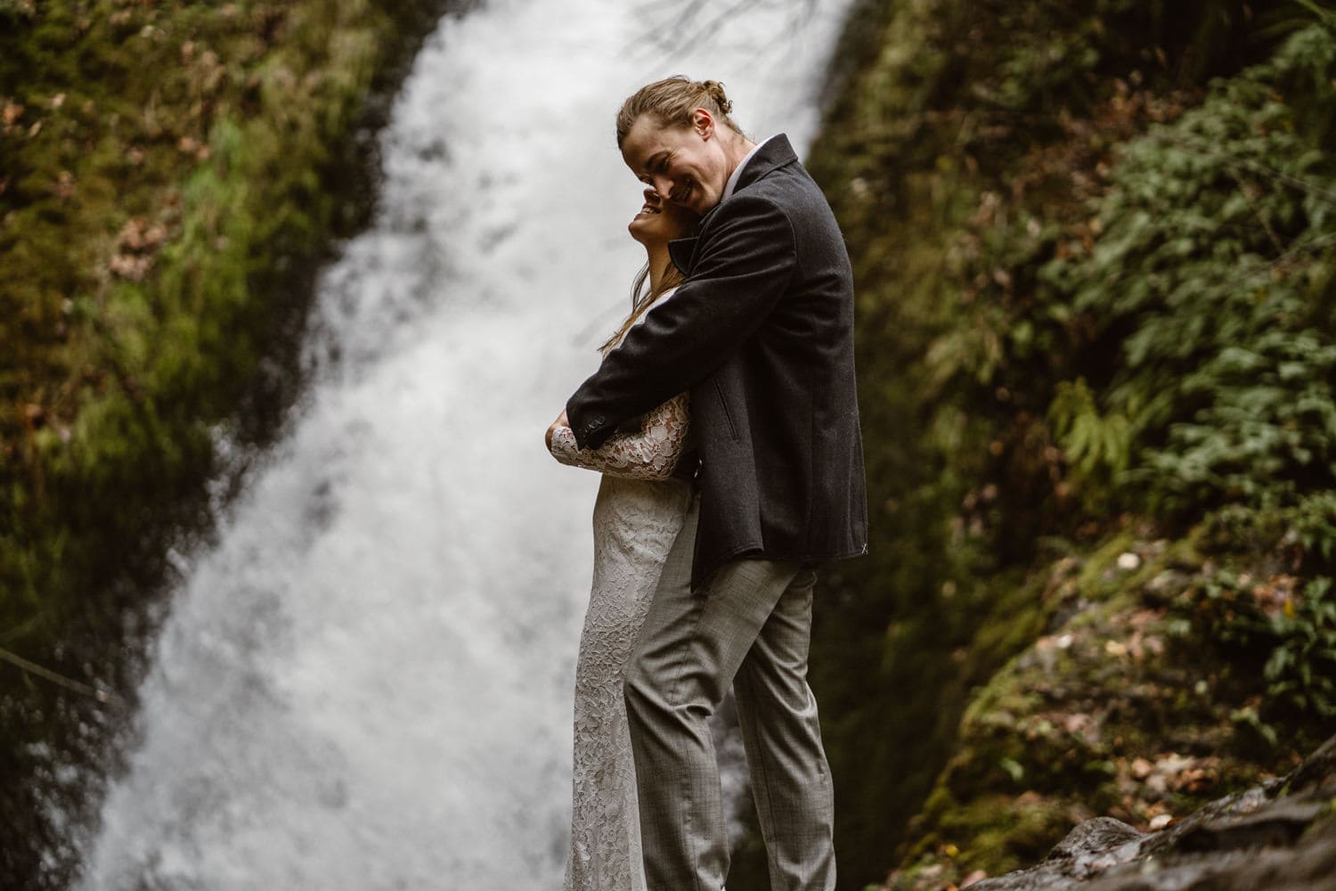 Oregon Bride and Groom Laughing at Oregon Adventurous Waterfall elopement