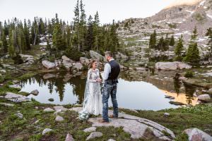 Vow ceremony next to an alpine lake tarn in Colorado.