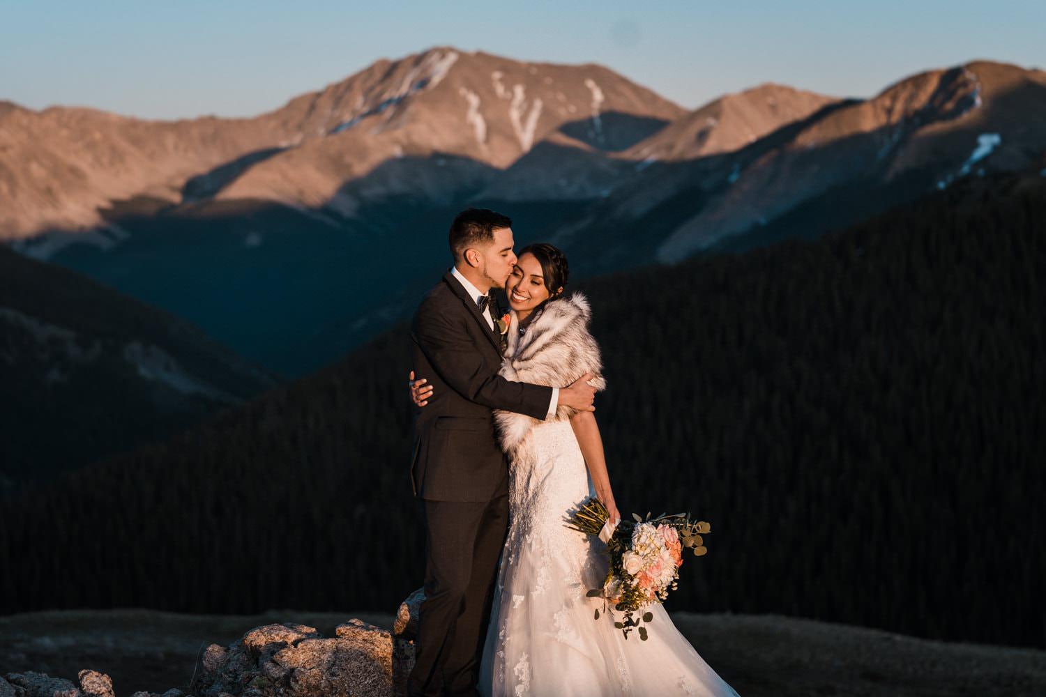 Bride and Groom Kissing at  Independence Pass Elopement
