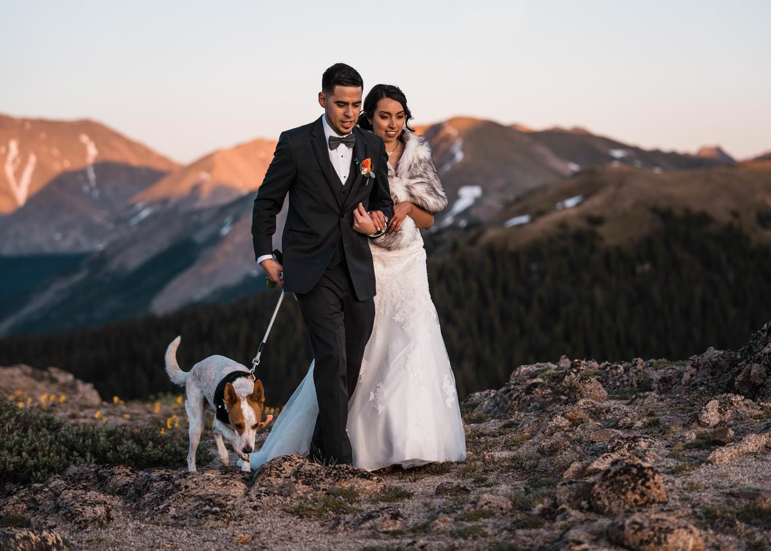 Bride and Groom Hiking at  Independence Pass Elopement