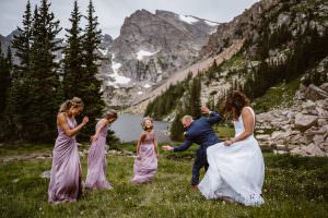 Family sharing a dance after eloping in the mountains of Colorado.