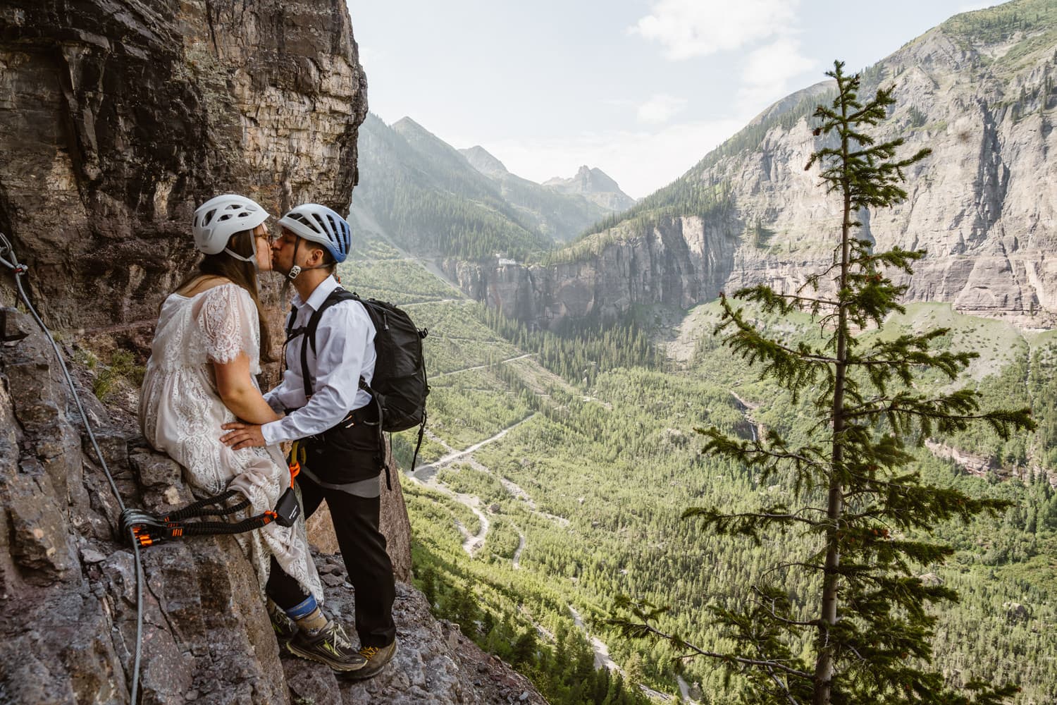 Couple climbing a via ferrata in Telluride for their elopement.