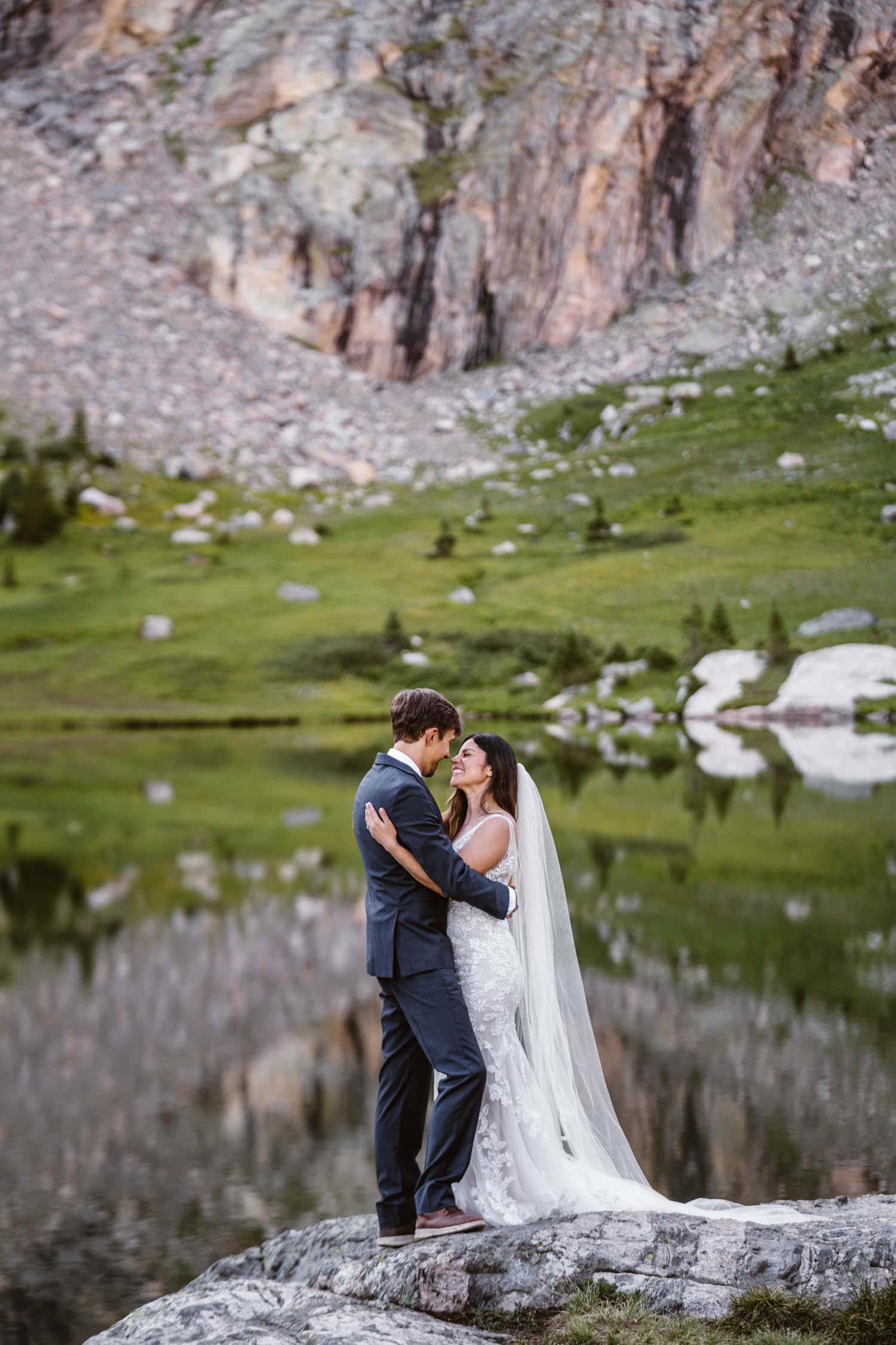 Bride and Groom Hugging Grand Lake Colorado Elopement