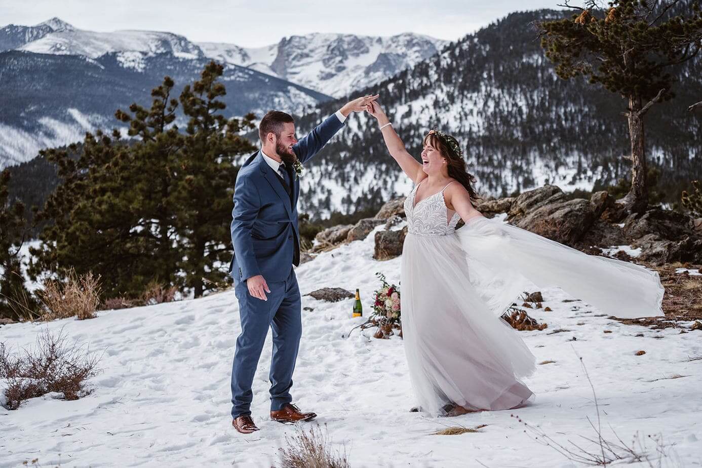 An elopement first dance in the snow of Colorado.