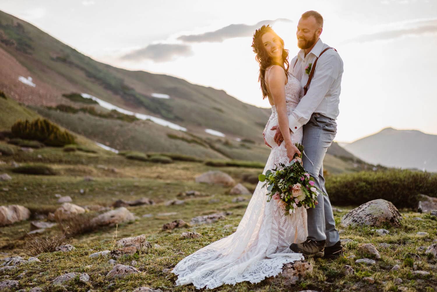 The groom grabbing his wifes booty on their elopement in Colorado.