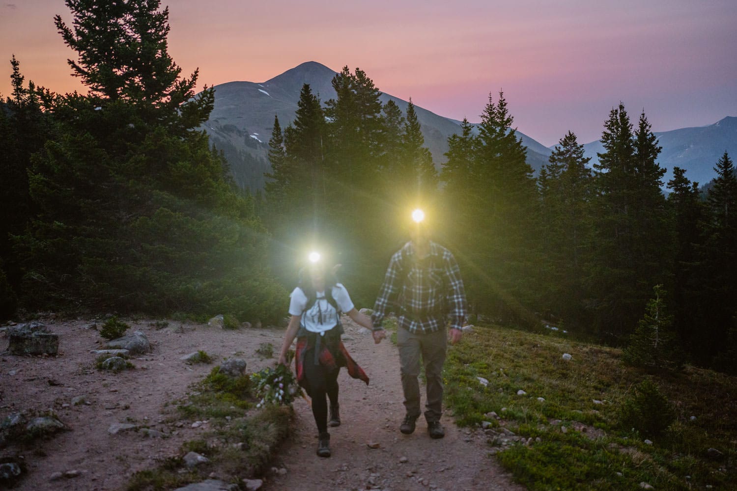 Bride and Groom Hiking at Sunrise Elopement in Colorado