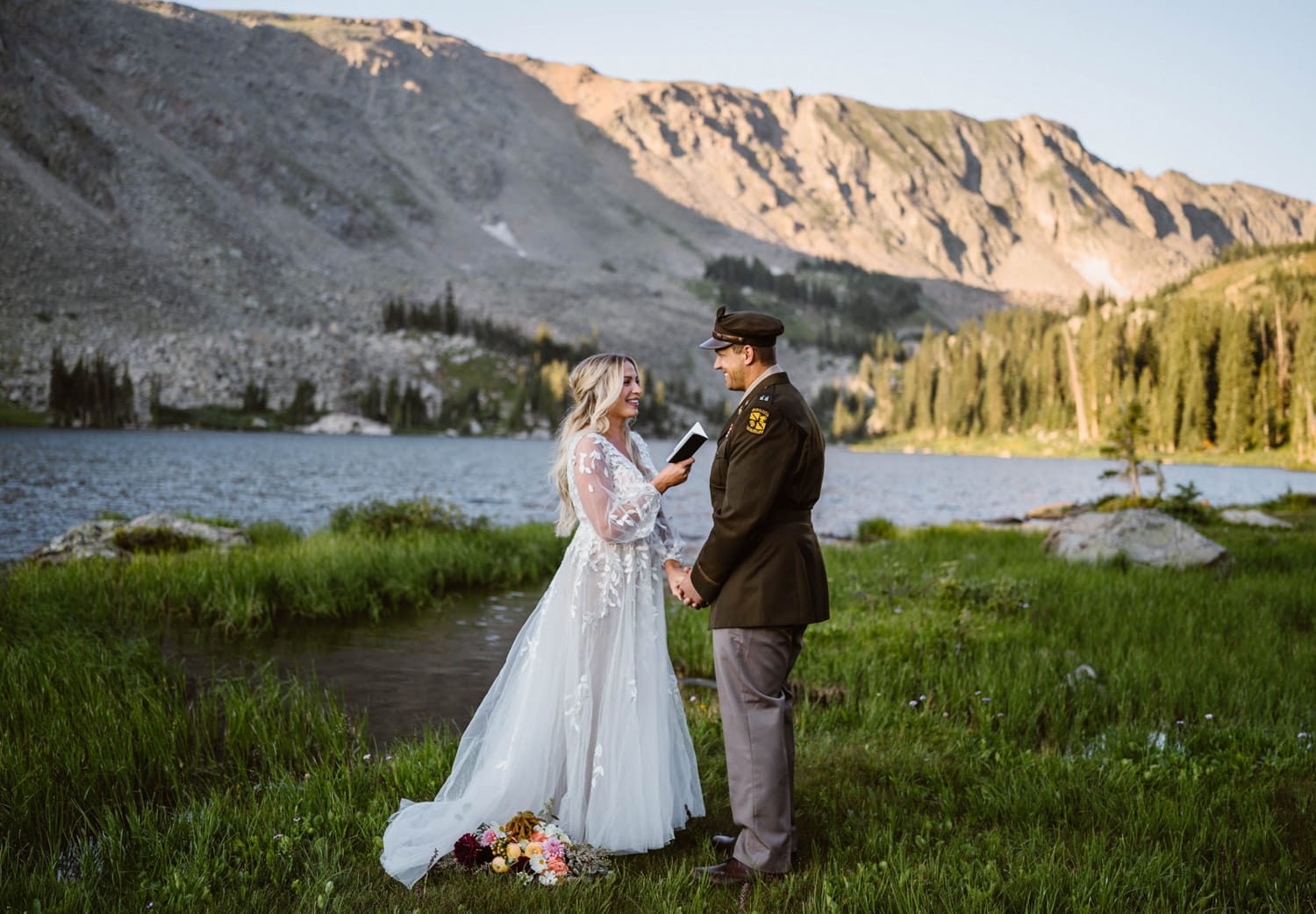 A couple sharing a laugh during their vow ceremony in the mountains of Colorado.
