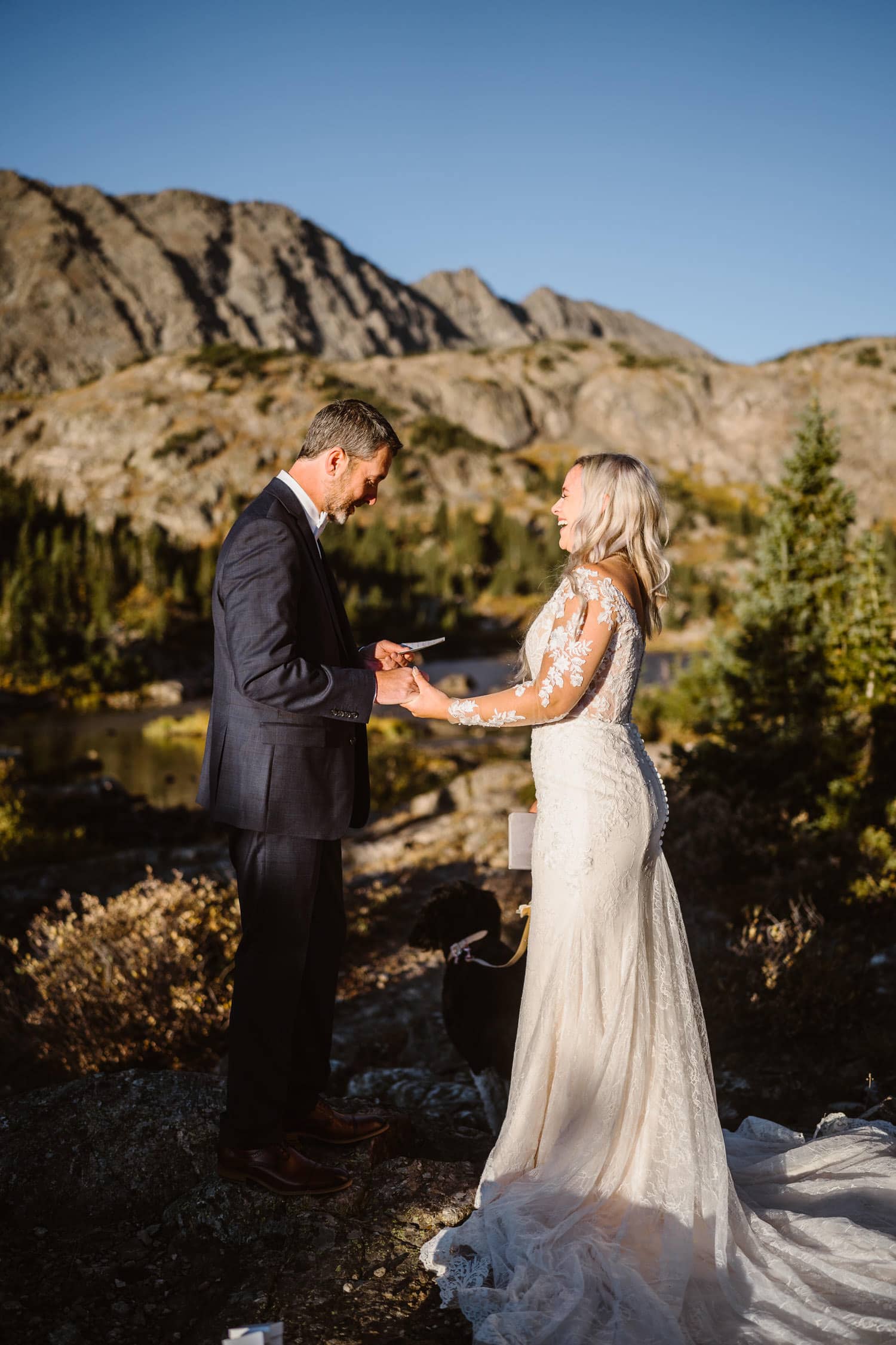 Bride and Groom Laughing at Sunrise Elopement in Colorado