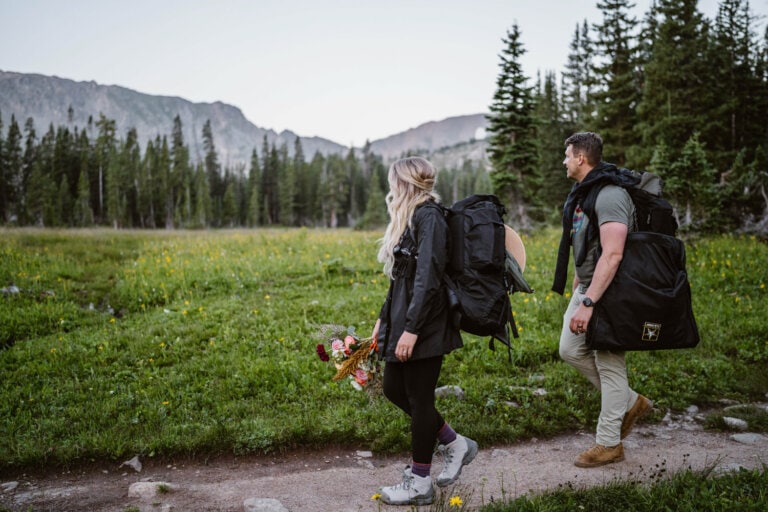 Couple hiking in for their elopement in Colorado.
