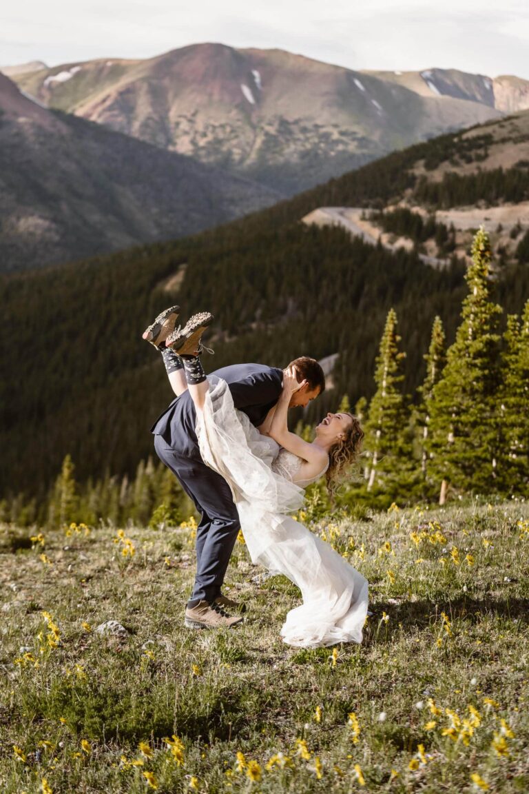 Mountain town elopement in Colorado Bride getting dipped by husband during their Colorado elopement