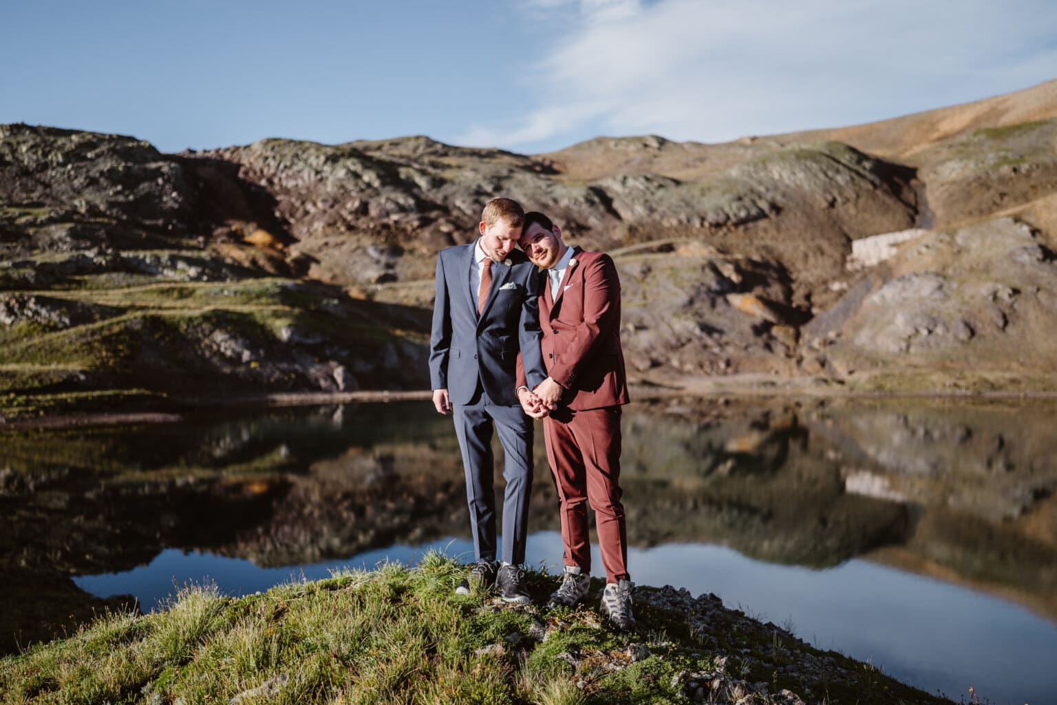 An LGBQT couple near an alpine lake on their elopement in the San Juan mountains of Colorado.