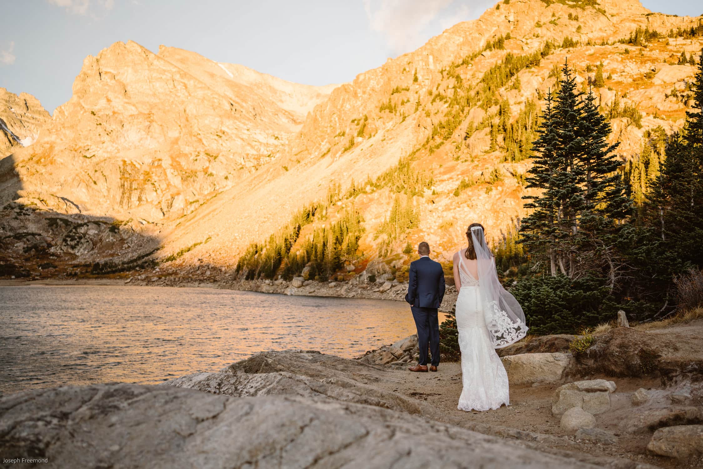 Couple sharing a first look for their Lake Isabelle elopement.