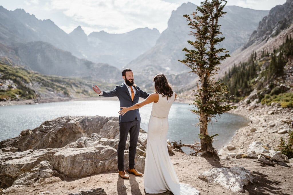 Couple hugging for their Lake Isabelle elopement.