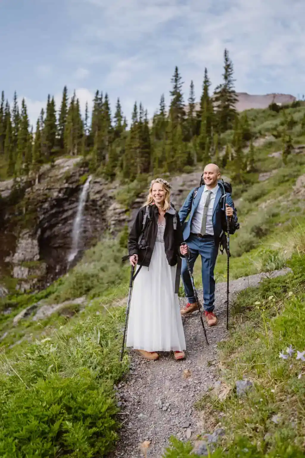 Couple hiking down the mountain in Telluride for their Colorado elopement