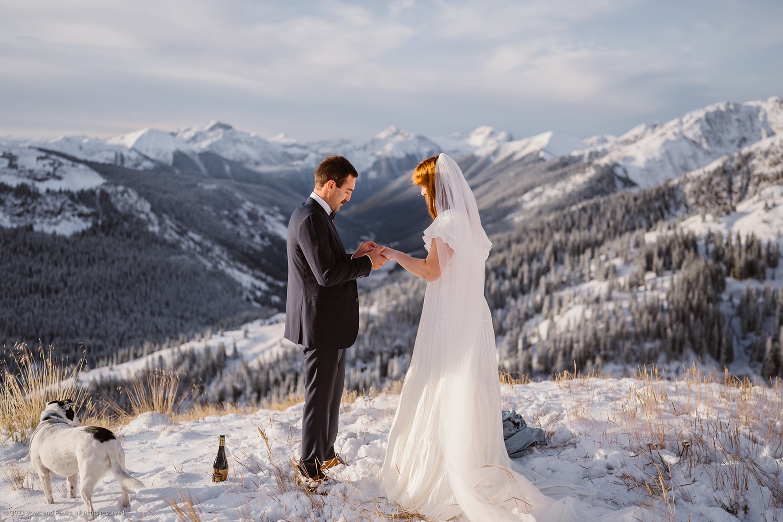 Couple marrying themselves in Colorado in the snow.
