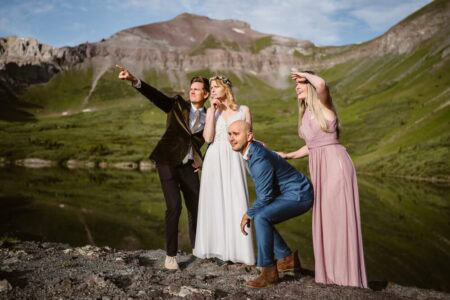 Group of friends near a lake for their Colorado elopement.
