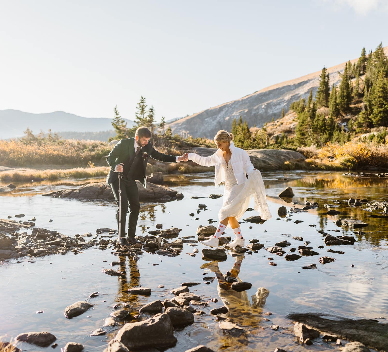 Couple hiking at their Breckenridge elopement.