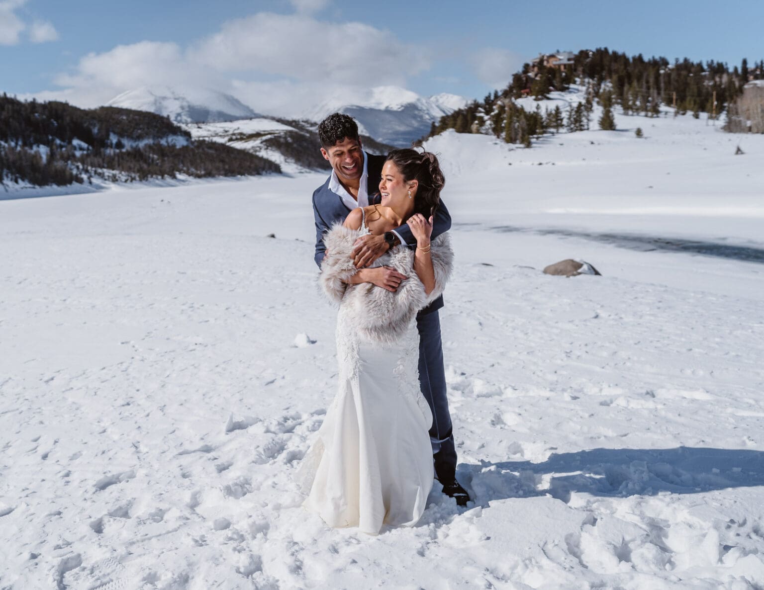 Couple on the snow for their Breckenridge elopement.