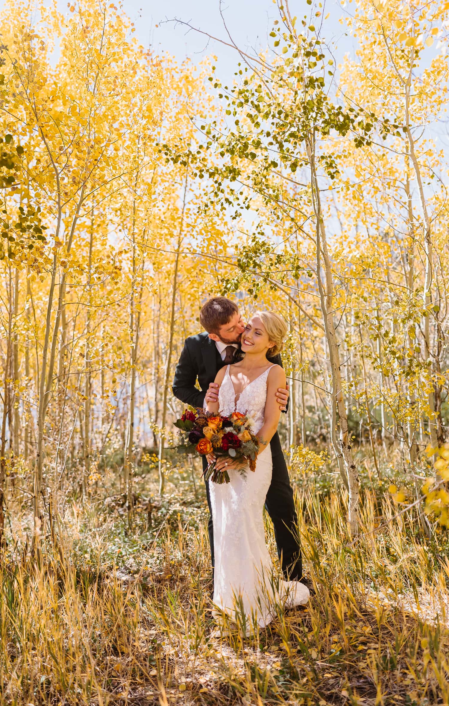 Couple in the fall colors for their Breckenridge, Colorado elopement.