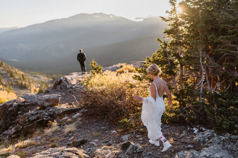 Couple hiking for first look at their Colorado elopement.