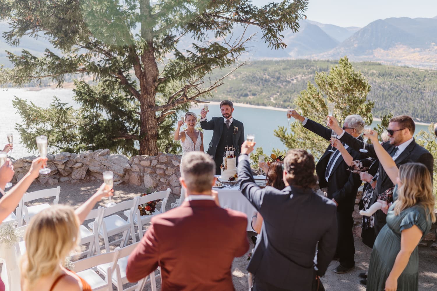 Couple sharing a toast for their Breckenridge, Colorado elopement.